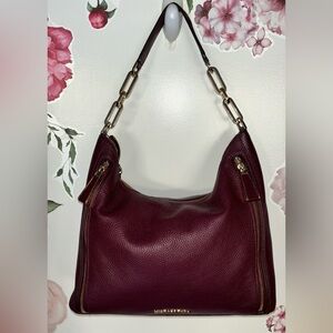Michael Kors Handbag in a Beautiful Plum color size Large